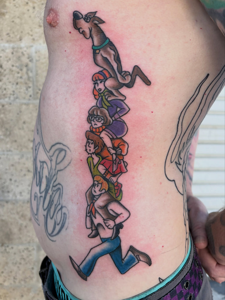 Scooby-Doo gang rib tattoo by Ivanna